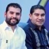 Octavio Ocampo y Pablo Varona Estrada junto a ciudadanos en espacio público durante el Segundo Informe de Gobierno en Huetamo, Michoacán
