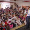 Carlos Torres Piña hablando ante micrófonos en Morelia, Michoacán, durante evento sobre combate al huachicol fiscal y fortalecimiento institucional