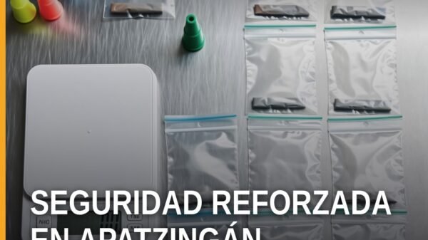 Ilustración simbólica de balanza de justicia y escudo sobre fondo con silueta de Apatzingán; fiscalía michoacán seguridad