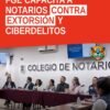 Grupo de notarios participando en taller de seguridad notarial michoacán, con pantallas digitales y materiales de prevención